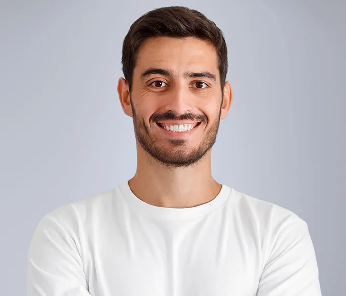 Dental Cleaning - Smiling man showing healthy teeth after visiting a family dentist in Bellingham.