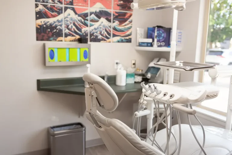 Modern dental operatory with comfortable chair and advanced equipment at Roots Dental in Bellingham, WA.